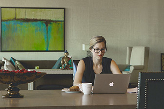 Women working on macbook